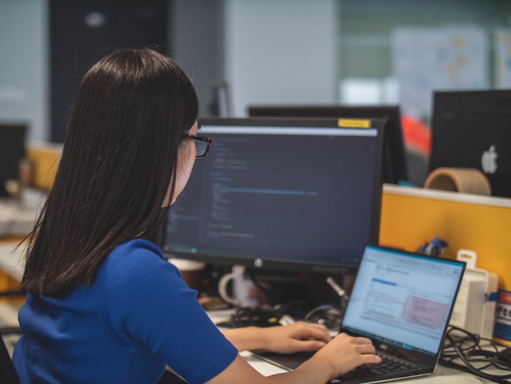 IT Developer working in the office, coding